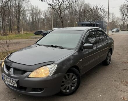 Сірий Міцубісі Lancer, об'ємом двигуна 1.6 л та пробігом 230 тис. км за 2799 $, фото 1 на Automoto.ua