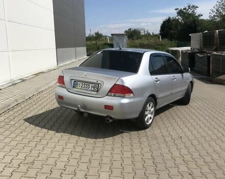 Сірий Міцубісі Lancer, об'ємом двигуна 1.58 л та пробігом 274 тис. км за 4400 $, фото 3 на Automoto.ua