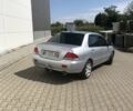 Сірий Міцубісі Lancer, об'ємом двигуна 1.58 л та пробігом 274 тис. км за 4400 $, фото 3 на Automoto.ua