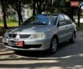 Серый Мицубиси Лансер, объемом двигателя 1.6 л и пробегом 196 тыс. км за 4490 $, фото 1 на Automoto.ua