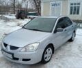 Сірий Міцубісі Lancer, об'ємом двигуна 1.6 л та пробігом 224 тис. км за 4000 $, фото 1 на Automoto.ua