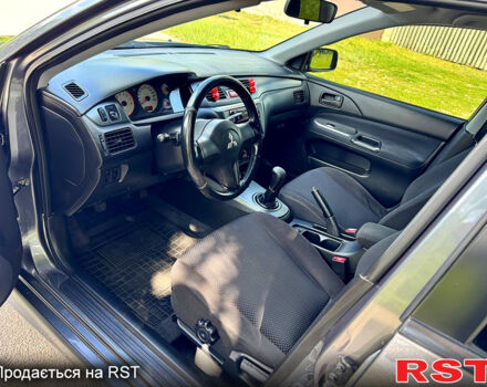 Серый Мицубиси Лансер, объемом двигателя 1.6 л и пробегом 188 тыс. км за 5490 $, фото 7 на Automoto.ua