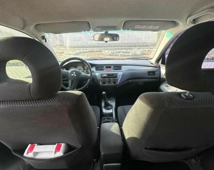 Серый Мицубиси Лансер, объемом двигателя 1.6 л и пробегом 170 тыс. км за 3700 $, фото 4 на Automoto.ua