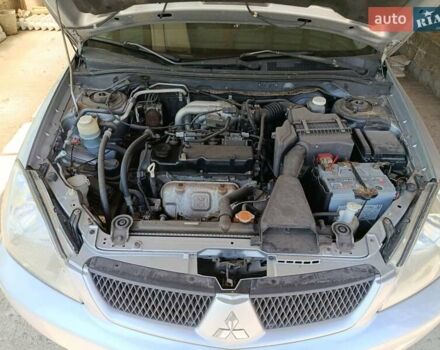 Сірий Міцубісі Lancer, об'ємом двигуна 1.58 л та пробігом 186 тис. км за 4300 $, фото 10 на Automoto.ua
