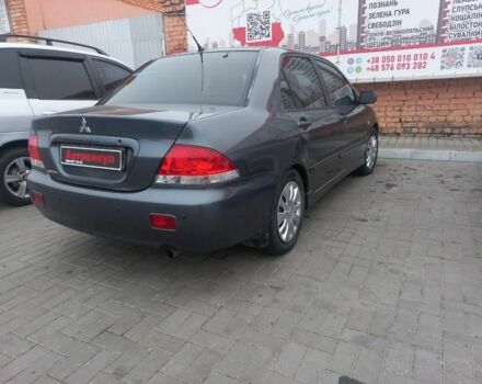 Серый Мицубиси Лансер, объемом двигателя 1.6 л и пробегом 162 тыс. км за 4650 $, фото 3 на Automoto.ua