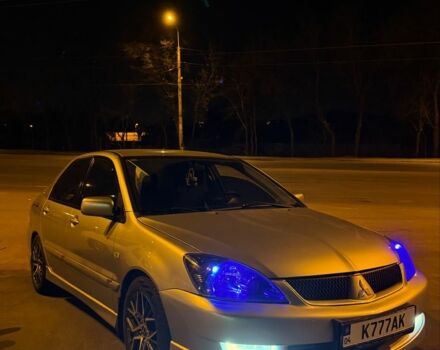 Серый Мицубиси Лансер, объемом двигателя 2 л и пробегом 256 тыс. км за 7000 $, фото 10 на Automoto.ua