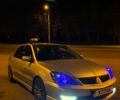 Серый Мицубиси Лансер, объемом двигателя 2 л и пробегом 256 тыс. км за 7000 $, фото 10 на Automoto.ua