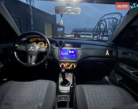 Серый Мицубиси Лансер, объемом двигателя 1.6 л и пробегом 213 тыс. км за 4500 $, фото 6 на Automoto.ua