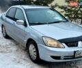 Серый Мицубиси Лансер, объемом двигателя 1.58 л и пробегом 333 тыс. км за 2950 $, фото 1 на Automoto.ua