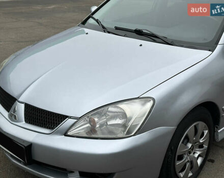 Серый Мицубиси Лансер, объемом двигателя 1.58 л и пробегом 183 тыс. км за 4800 $, фото 2 на Automoto.ua