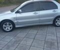 Мицубиси Лансер 2006 в Каменское - Днепродзержинск на Automoto.ua Серый Мицубиси Лансер, объемом двигателя 1.58 л и пробегом 238 тыс. км за 5400 $, фото 5 на Automoto.ua