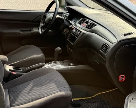 Серый Мицубиси Лансер, объемом двигателя 1.6 л и пробегом 220 тыс. км за 4400 $, фото 11 на Automoto.ua