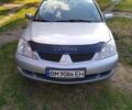 Сірий Міцубісі Lancer, об'ємом двигуна 1.58 л та пробігом 280 тис. км за 3900 $, фото 1 на Automoto.ua