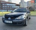 Сірий Міцубісі Lancer, об'ємом двигуна 1.58 л та пробігом 267 тис. км за 3999 $, фото 1 на Automoto.ua