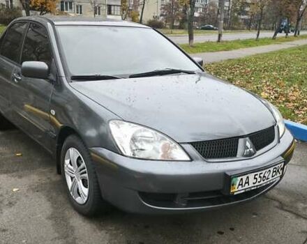 Серый Мицубиси Лансер, объемом двигателя 1.6 л и пробегом 263 тыс. км за 3800 $, фото 5 на Automoto.ua