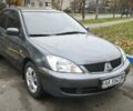 Серый Мицубиси Лансер, объемом двигателя 1.6 л и пробегом 263 тыс. км за 3800 $, фото 5 на Automoto.ua