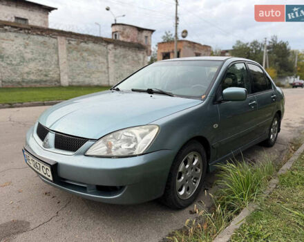 Серый Мицубиси Лансер, объемом двигателя 1.58 л и пробегом 260 тыс. км за 4050 $, фото 5 на Automoto.ua