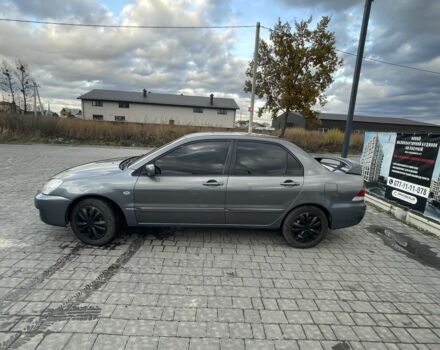 Серый Мицубиси Лансер, объемом двигателя 1.6 л и пробегом 213 тыс. км за 4450 $, фото 6 на Automoto.ua