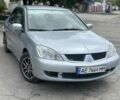 Сірий Міцубісі Lancer, об'ємом двигуна 1.6 л та пробігом 220 тис. км за 4800 $, фото 2 на Automoto.ua