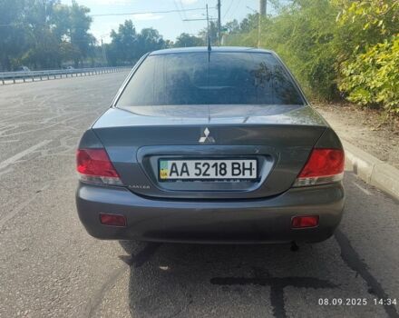 Сірий Міцубісі Lancer, об'ємом двигуна 1.6 л та пробігом 240 тис. км за 4400 $, фото 3 на Automoto.ua