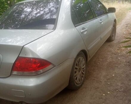 Сірий Міцубісі Lancer, об'ємом двигуна 1.6 л та пробігом 3 тис. км за 3200 $, фото 4 на Automoto.ua