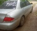 Сірий Міцубісі Lancer, об'ємом двигуна 1.6 л та пробігом 3 тис. км за 3200 $, фото 4 на Automoto.ua