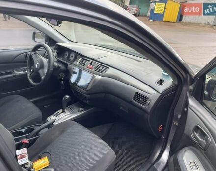 Сірий Міцубісі Lancer, об'ємом двигуна 1.6 л та пробігом 262 тис. км за 4400 $, фото 9 на Automoto.ua