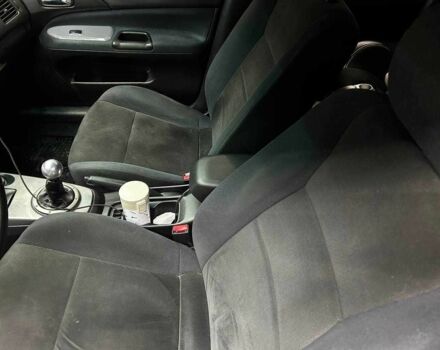 Серый Мицубиси Лансер, объемом двигателя 1.6 л и пробегом 300 тыс. км за 4600 $, фото 9 на Automoto.ua