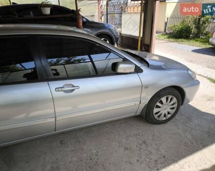 Сірий Міцубісі Lancer, об'ємом двигуна 1.58 л та пробігом 186 тис. км за 4300 $, фото 7 на Automoto.ua