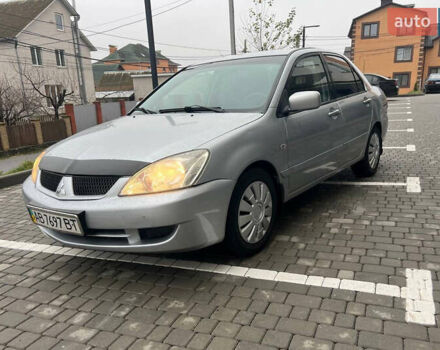 Сірий Міцубісі Lancer, об'ємом двигуна 1.58 л та пробігом 333 тис. км за 2999 $, фото 3 на Automoto.ua