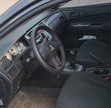 Мицубиси Лансер 2006 в Днепре (Днепропетровске) на Automoto.ua Серый Мицубиси Лансер, объемом двигателя 1.6 л и пробегом 270 тыс. км за 4800 $, фото 2 на Automoto.ua