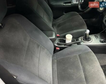 Серый Мицубиси Лансер, объемом двигателя 1.58 л и пробегом 300 тыс. км за 4600 $, фото 12 на Automoto.ua