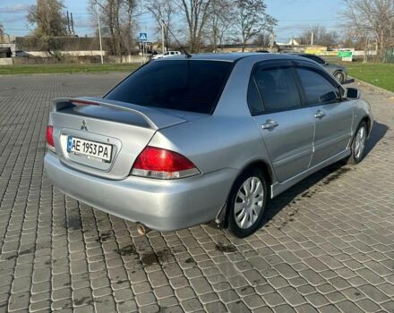 Серый Мицубиси Лансер, объемом двигателя 1.6 л и пробегом 170 тыс. км за 3700 $, фото 3 на Automoto.ua