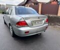 Сірий Міцубісі Lancer, об'ємом двигуна 1.58 л та пробігом 333 тис. км за 2750 $, фото 4 на Automoto.ua