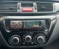 Серый Мицубиси Лансер, объемом двигателя 1.6 л и пробегом 333 тыс. км за 2800 $, фото 11 на Automoto.ua