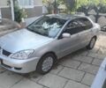 Сірий Міцубісі Lancer, об'ємом двигуна 1.6 л та пробігом 188 тис. км за 4000 $, фото 1 на Automoto.ua