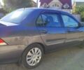 Сірий Міцубісі Lancer, об'ємом двигуна 1.6 л та пробігом 229 тис. км за 4900 $, фото 18 на Automoto.ua