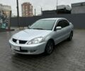 Сірий Міцубісі Lancer, об'ємом двигуна 1.6 л та пробігом 230 тис. км за 4500 $, фото 1 на Automoto.ua