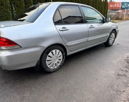 Сірий Міцубісі Lancer, об'ємом двигуна 1.58 л та пробігом 333 тис. км за 2999 $, фото 8 на Automoto.ua