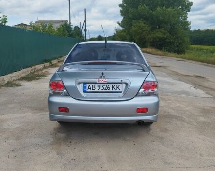 Серый Мицубиси Лансер, объемом двигателя 2 л и пробегом 306 тыс. км за 4100 $, фото 4 на Automoto.ua