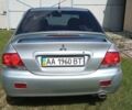 Сірий Міцубісі Lancer, об'ємом двигуна 1.6 л та пробігом 410 тис. км за 4500 $, фото 1 на Automoto.ua