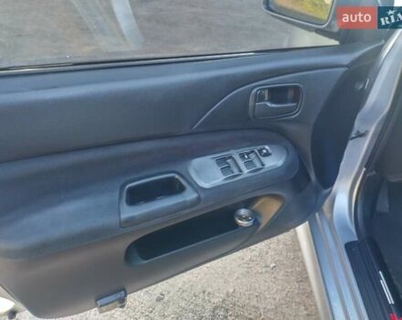 Серый Мицубиси Лансер, объемом двигателя 1.58 л и пробегом 250 тыс. км за 4700 $, фото 15 на Automoto.ua