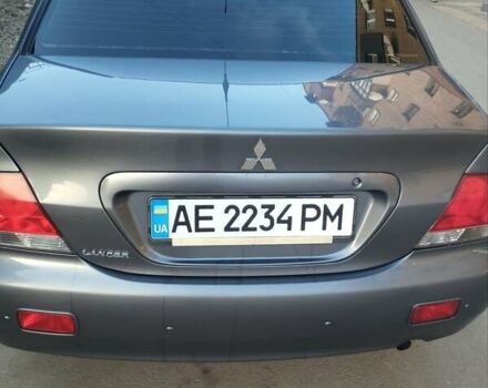 Сірий Міцубісі Lancer, об'ємом двигуна 1.58 л та пробігом 217 тис. км за 3500 $, фото 1 на Automoto.ua