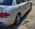 Сірий Міцубісі Lancer, об'ємом двигуна 1.58 л та пробігом 305 тис. км за 3800 $, фото 1 на Automoto.ua