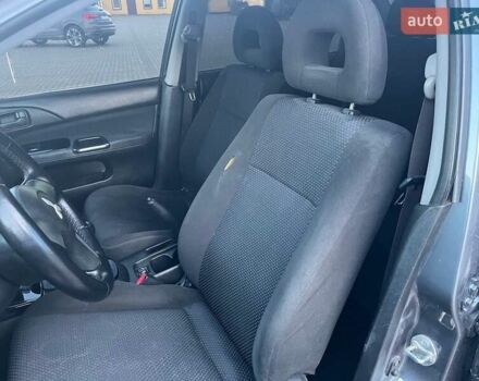 Серый Мицубиси Лансер, объемом двигателя 1.6 л и пробегом 279 тыс. км за 3990 $, фото 13 на Automoto.ua