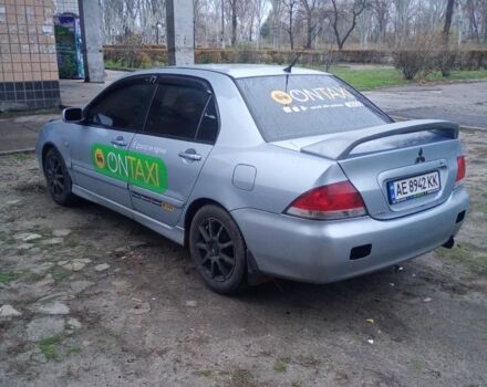 Сірий Міцубісі Lancer, об'ємом двигуна 1.6 л та пробігом 264 тис. км за 3200 $, фото 3 на Automoto.ua