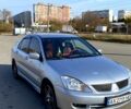 Сірий Міцубісі Lancer, об'ємом двигуна 1.6 л та пробігом 307 тис. км за 4599 $, фото 1 на Automoto.ua