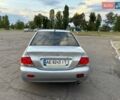 Серый Мицубиси Лансер, объемом двигателя 1.58 л и пробегом 420 тыс. км за 4200 $, фото 5 на Automoto.ua