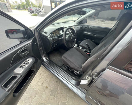 Сірий Міцубісі Lancer, об'ємом двигуна 1.58 л та пробігом 162 тис. км за 4650 $, фото 18 на Automoto.ua