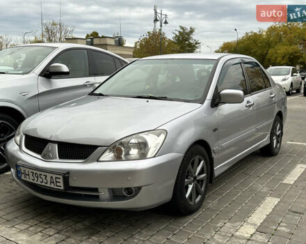 Серый Мицубиси Лансер, объемом двигателя 1.58 л и пробегом 244 тыс. км за 4950 $, фото 15 на Automoto.ua